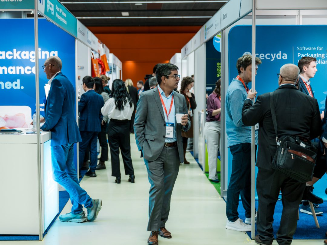 Packaging industry professionals at the Sustainable Packaging Summit expo floor